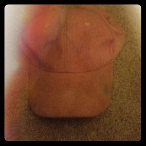 Pink tie-dye hat with blue on it